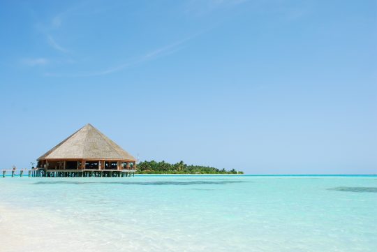 bungalows architecture and beach on a maldivian island QJeRGE